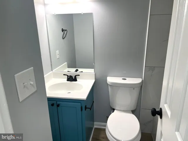 a bathroom with a shower and a shower