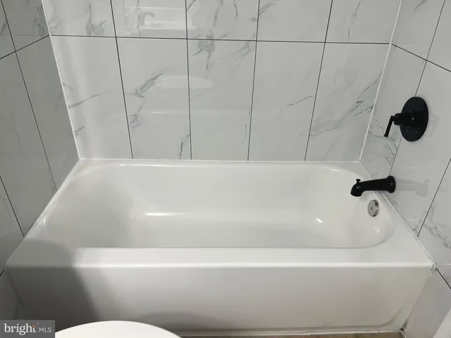 a view of a chandelier fan in a room