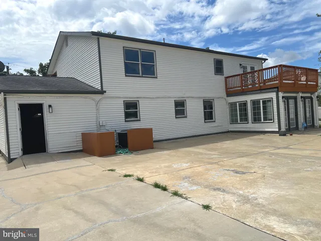 a view of a room with wooden walls