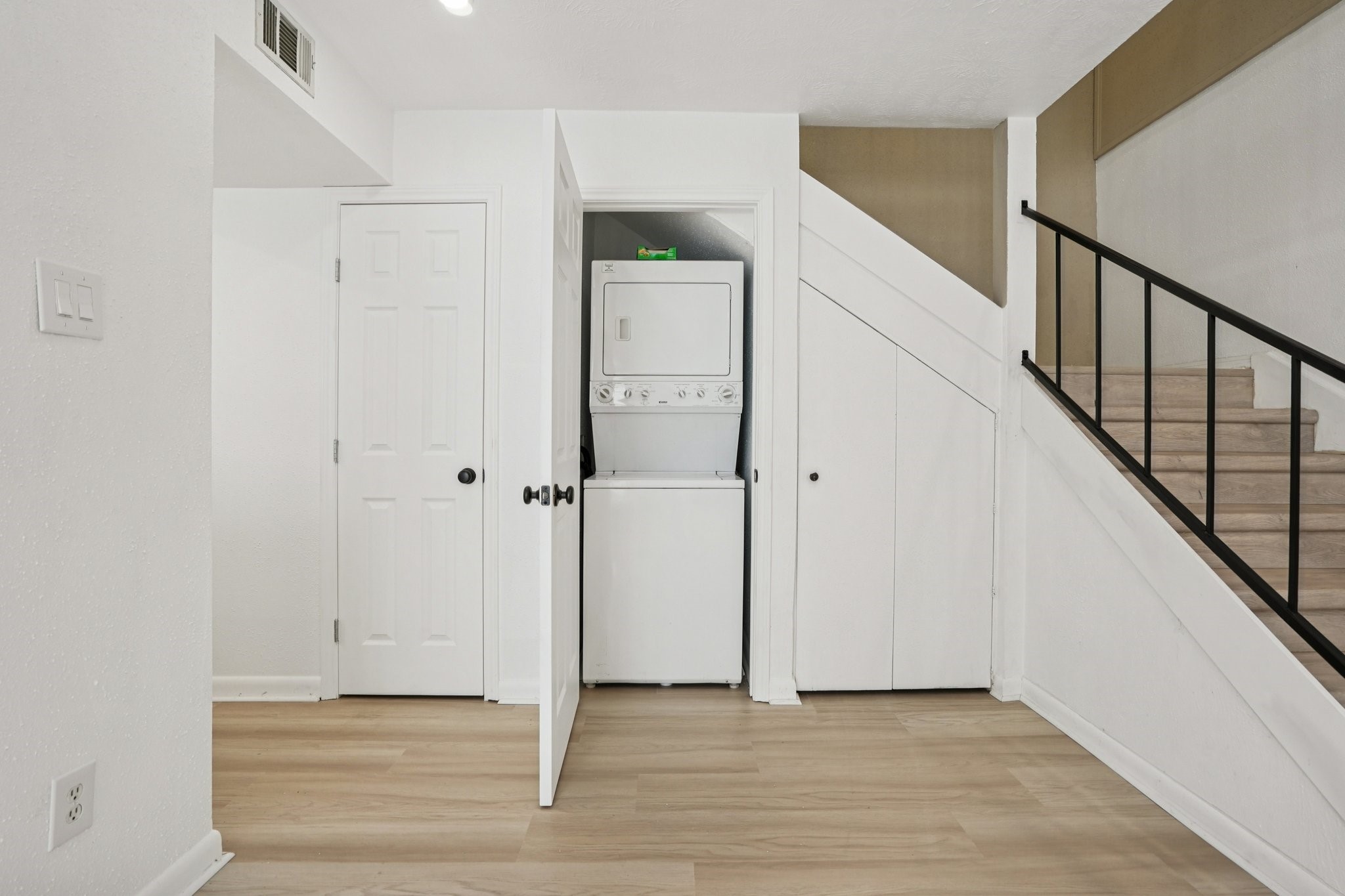 2800 Jeanetta Street, Unit 203 Houston, TX 77063 - Photo 13 of 28 a view of an entryway with wooden floor