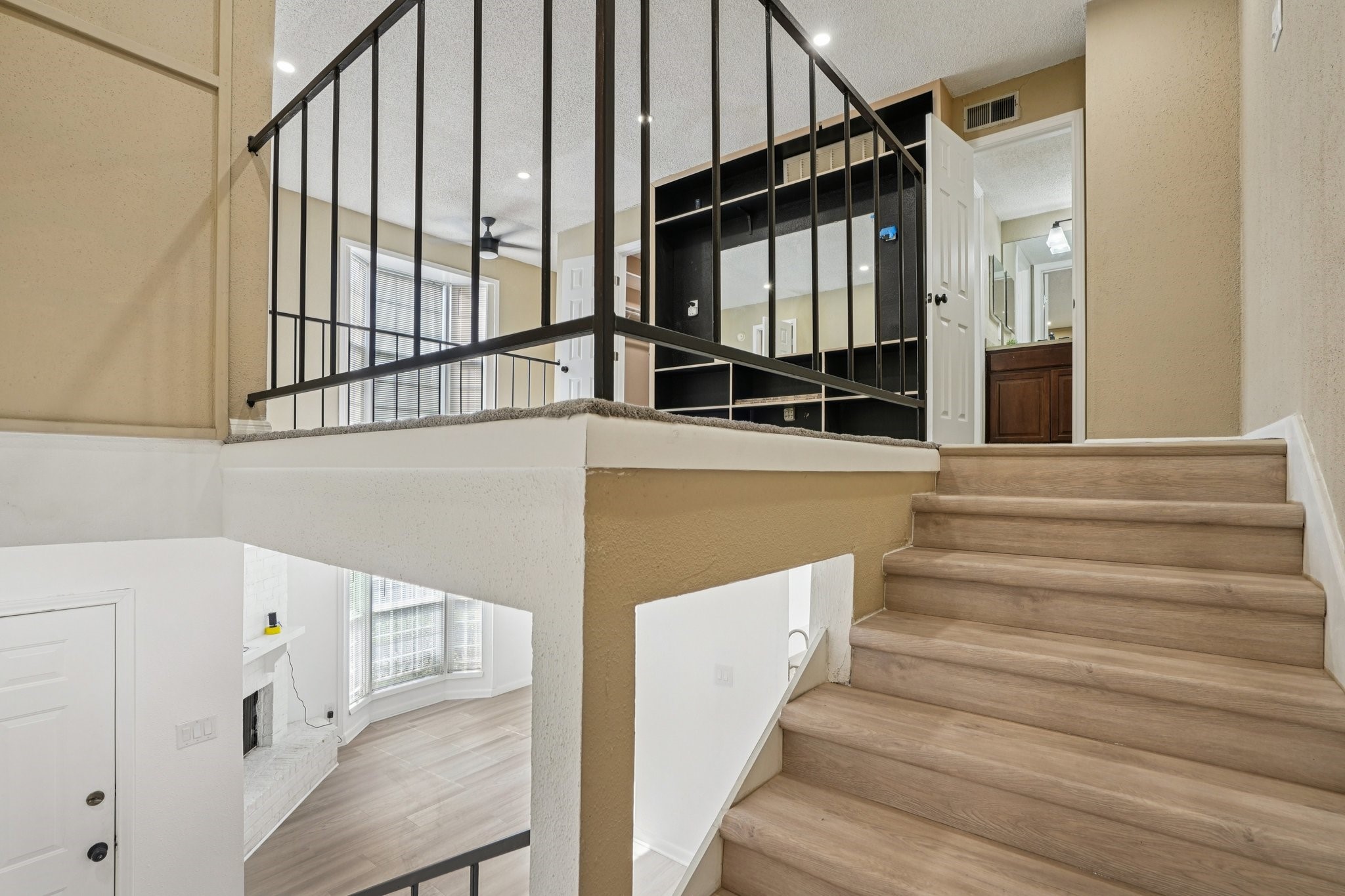 2800 Jeanetta Street, Unit 203 Houston, TX 77063 - Photo 16 of 28 a view of entryway and hall with wooden floor
