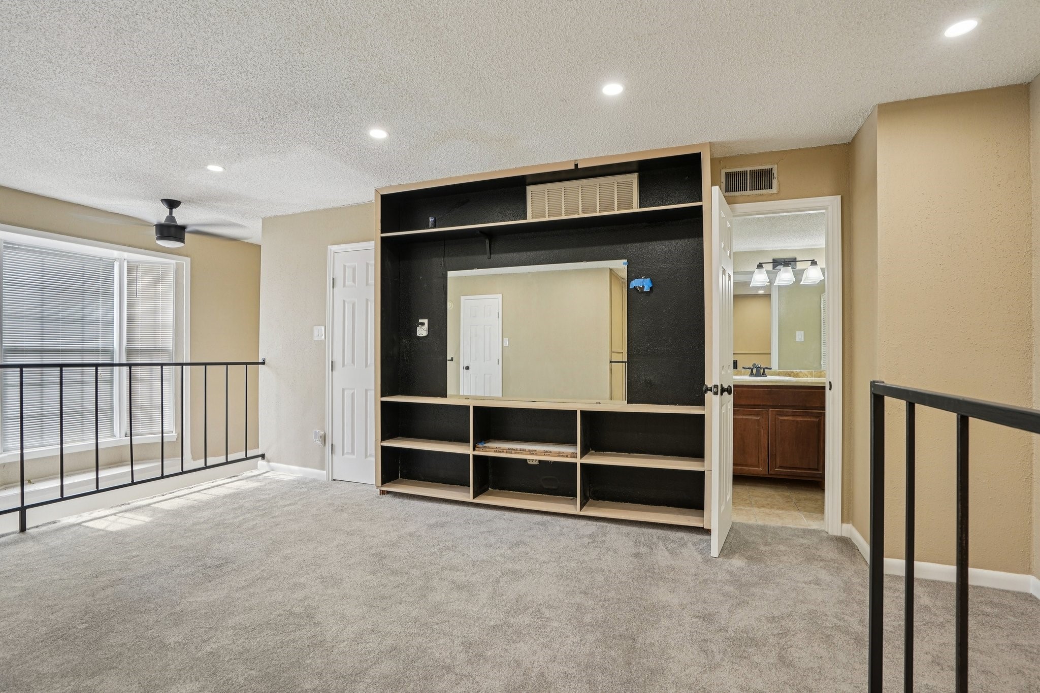 2800 Jeanetta Street, Unit 203 Houston, TX 77063 - Photo 18 of 28 a view of an empty room with a window