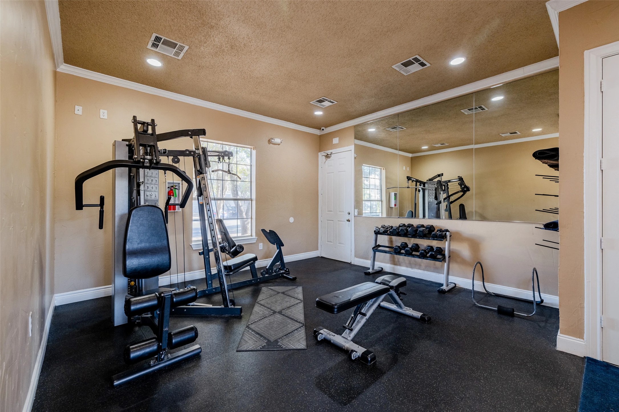 11908 Anderson Mill Road, Unit 331 Cedar Park, TX 78613 - Photo 21 of 24 a view of a room with gym equipment