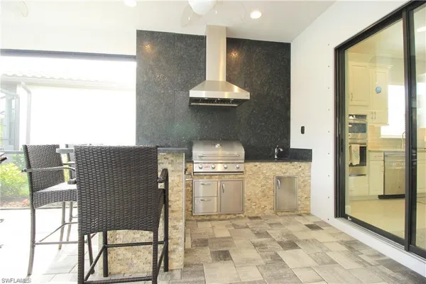 a kitchen with a table and a stove