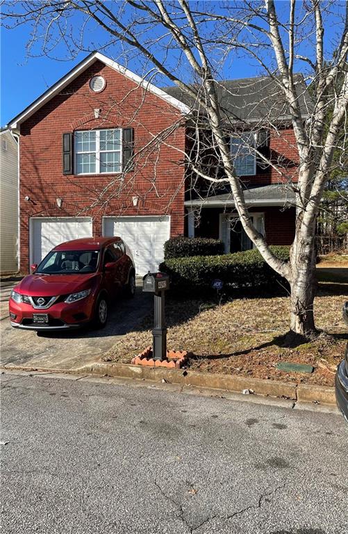 4092 Riverside Parkway Decatur, GA 30034 - Photo 1 of 1 a front view of a house with a yard