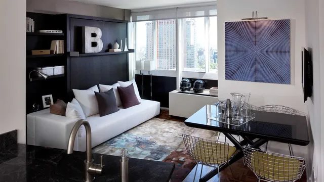 a living room with furniture and a window