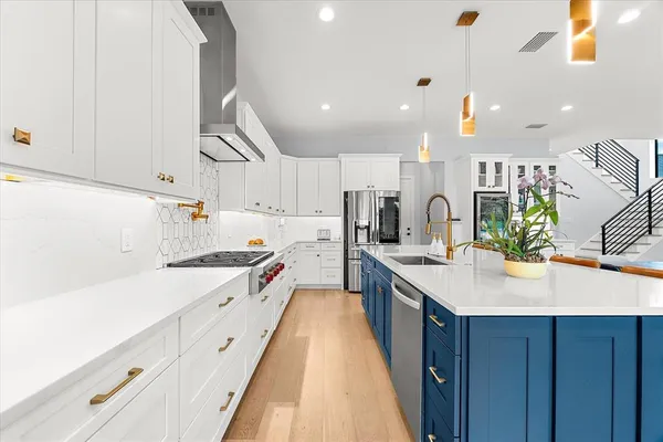 a bathroom with a toilet sink and shower