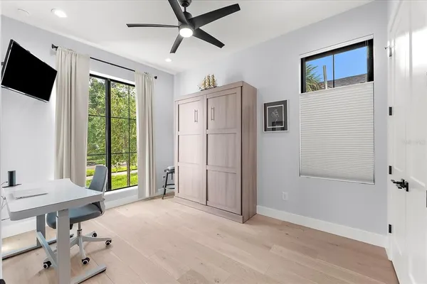 a bathroom with a bathtub and a sink
