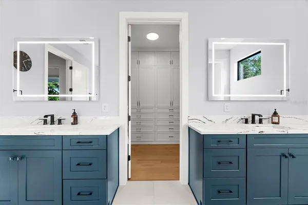 a view of a backyard with sitting area