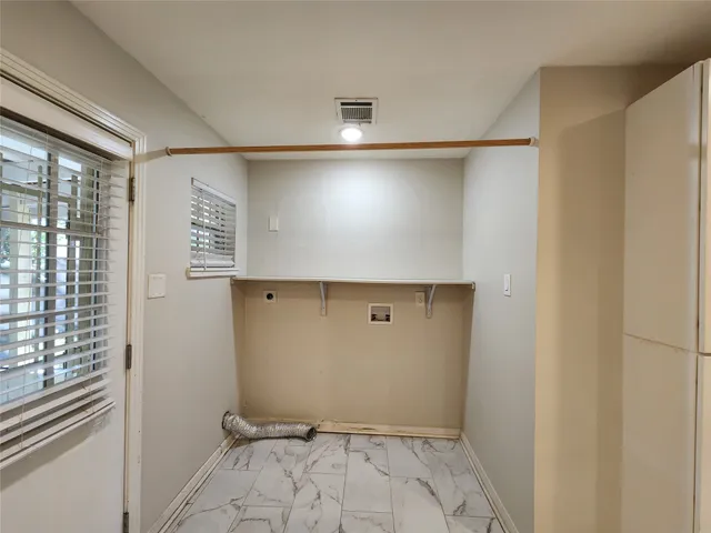 a view of a hallway with closet