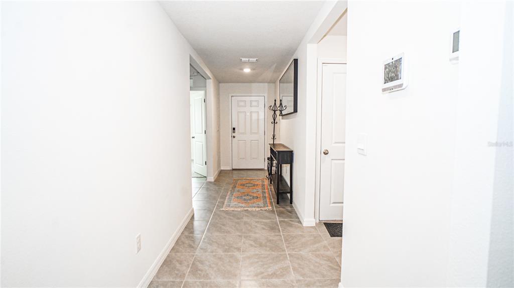 13253 Mylion Way Spring Hill, FL 34610 - Photo 12 of 31 a bathroom with a sink and a mirror