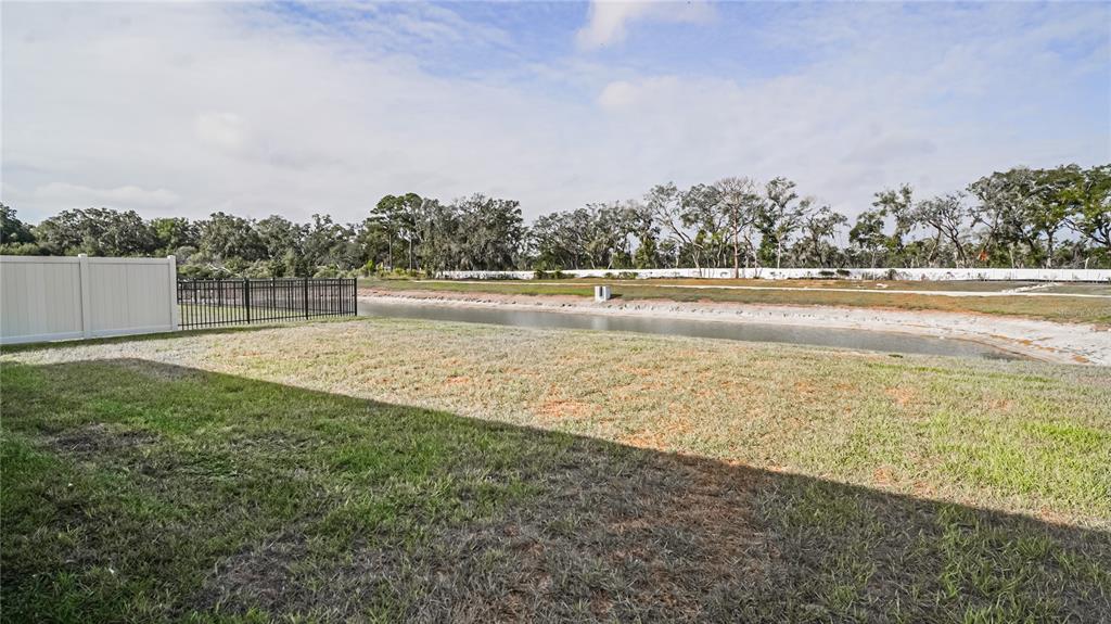 13253 Mylion Way Spring Hill, FL 34610 - Photo 28 of 31 a view of an ocean and beach