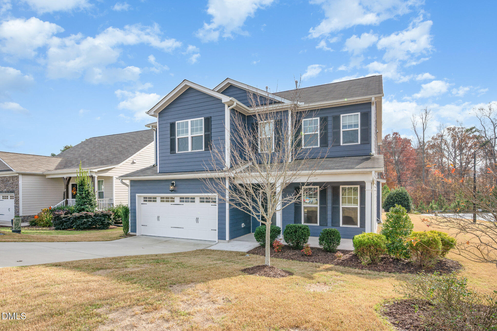 18 Dover Ridge Court Chapel Hill, NC 27517 - Photo 2 of 40 a view of a big house with a yard and plants