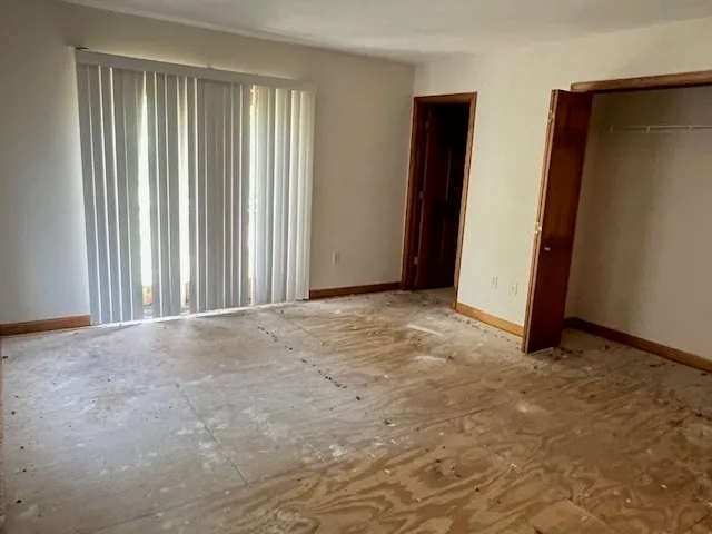 an empty room with windows