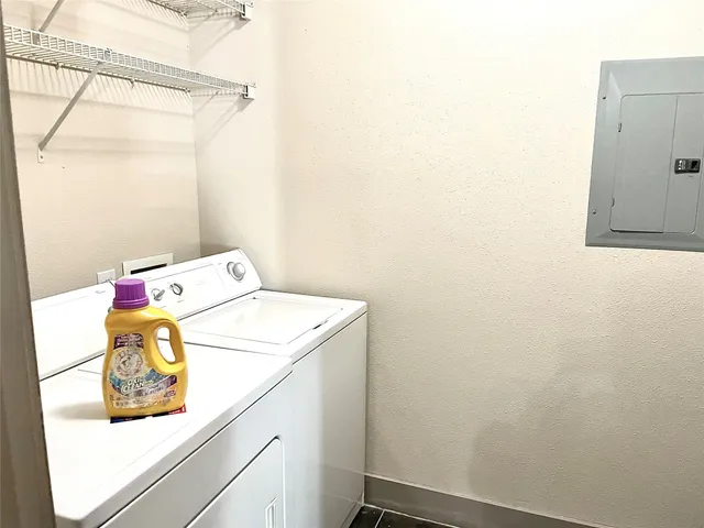 a black and white photo of a living room
