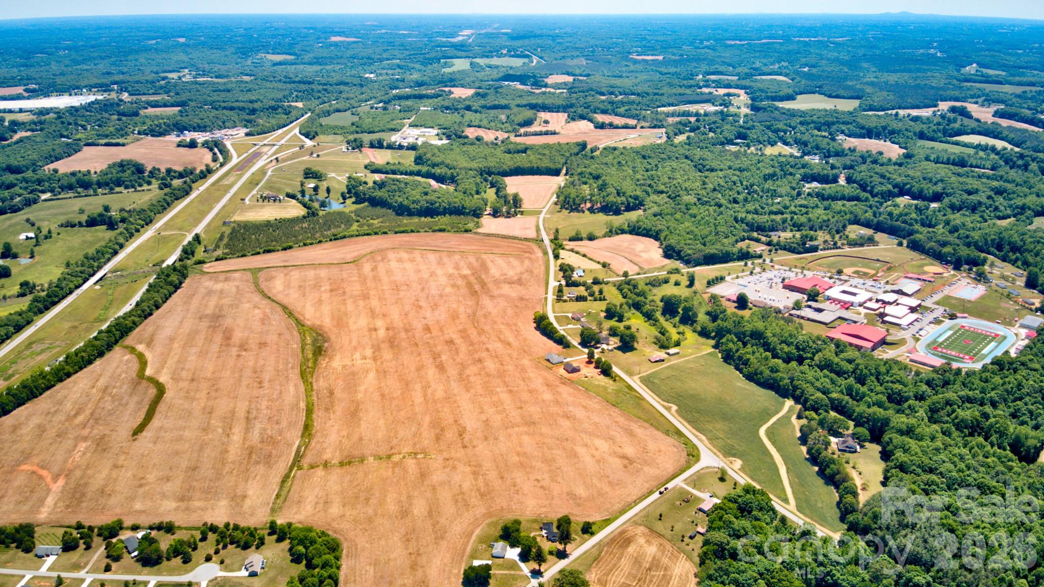 0 Jennings Road Olin, NC 28660 - Photo 1 of 33 an aerial view of residential houses with outdoor space