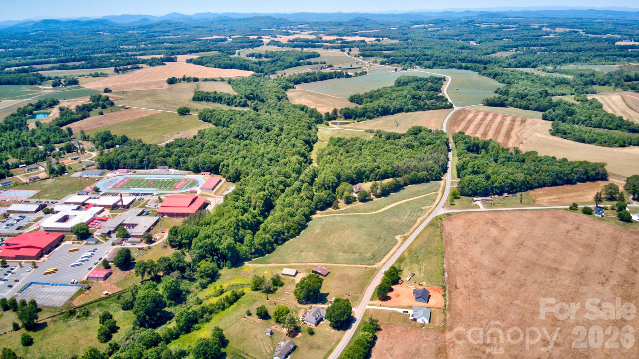 0 Jennings Road Olin, NC 28660 - Photo 20 of 33 an aerial view of residential houses with outdoor space and street view