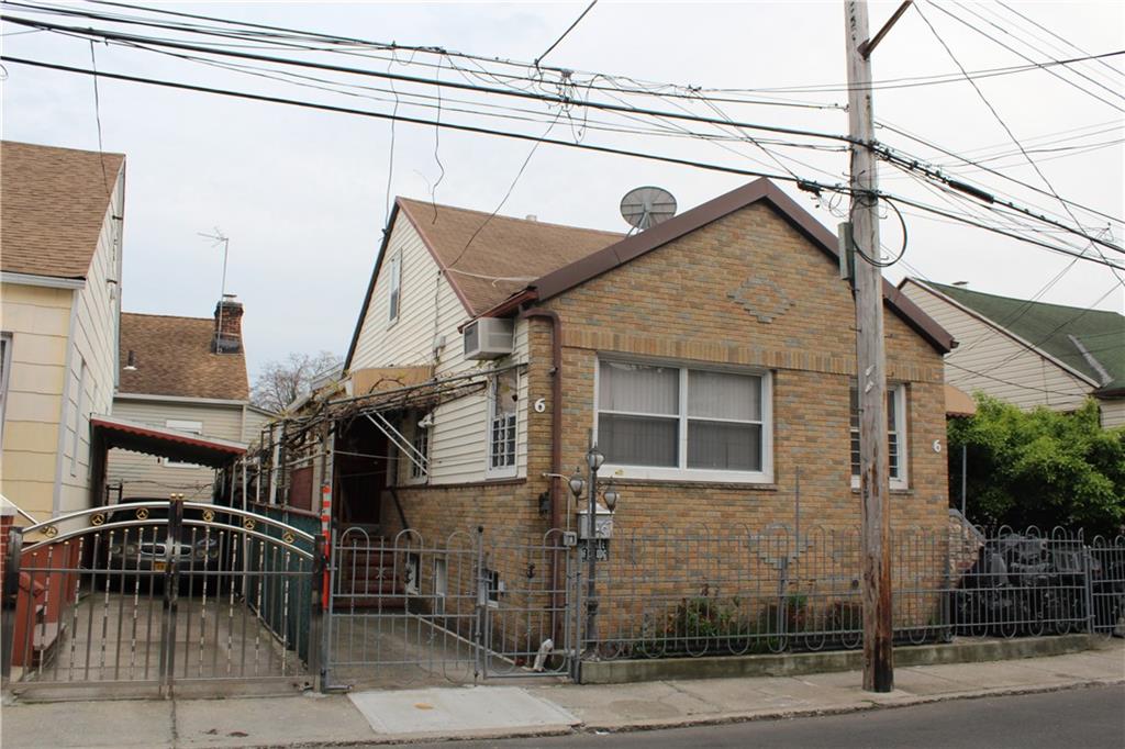a front view of a house with garage