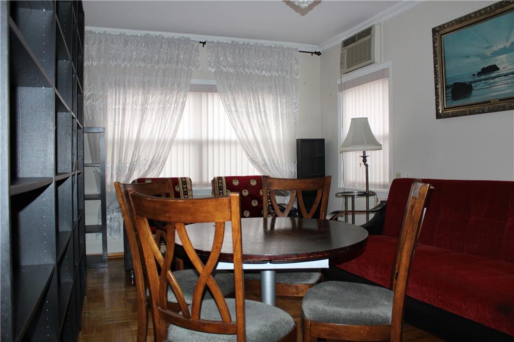 6 Brighton 10th Terrace Brooklyn, NY 11235 - Photo 3 of 8 a view of a dining room with furniture
