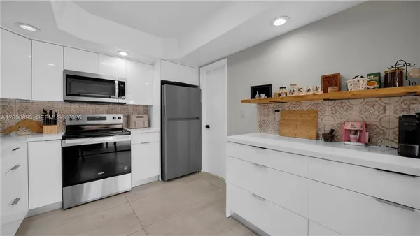 $405,000 | 8186 Northwest 98th Lane, Unit 123, Hialeah Gardens, FL 33016