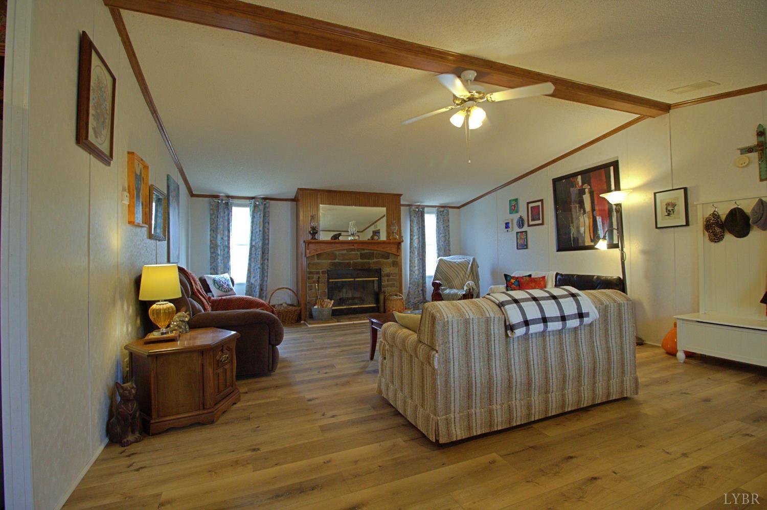 2112 Morning Star Road Appomattox, VA 24522 - Photo 7 of 24 a living room with furniture and a flat screen tv