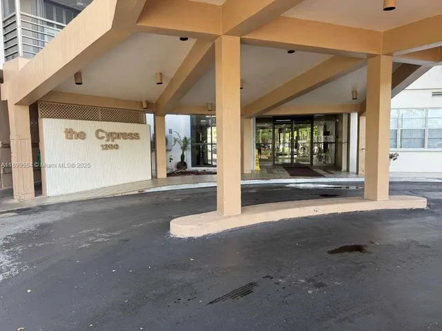 a view of a building with brick walls