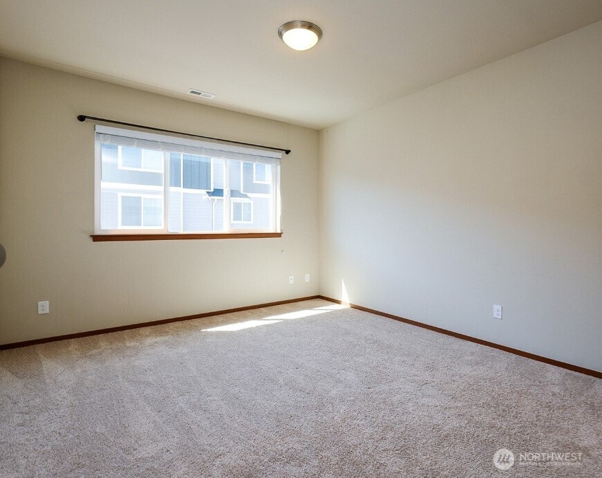 2425 Schley Boulevard Bremerton, WA 98310 - Photo 14 of 23 an empty room with a window