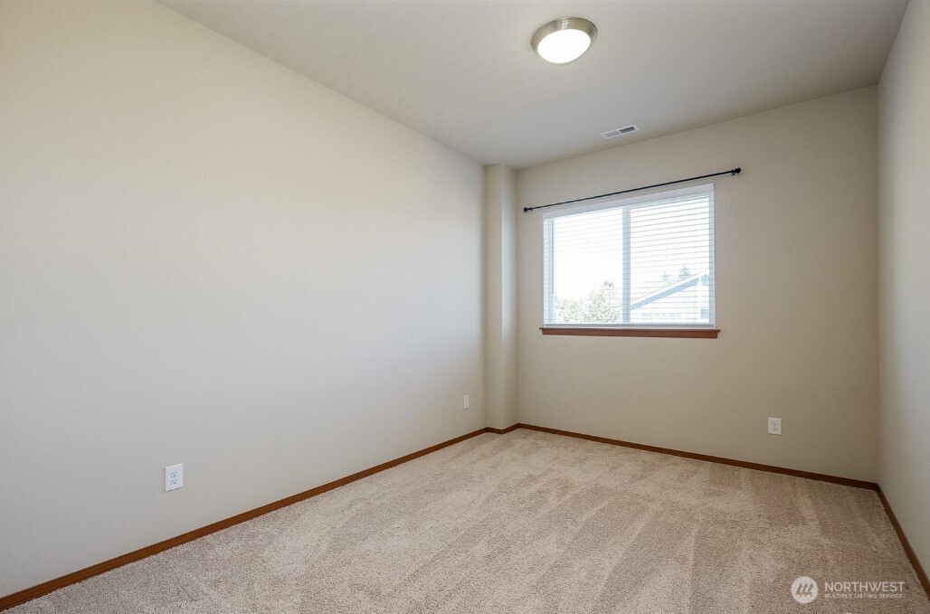 2425 Schley Boulevard Bremerton, WA 98310 - Photo 16 of 23 an empty room with a window