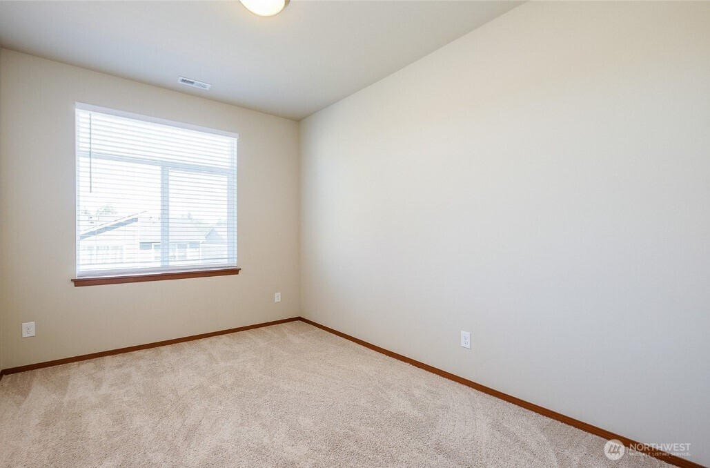 2425 Schley Boulevard Bremerton, WA 98310 - Photo 18 of 23 an empty room with a window