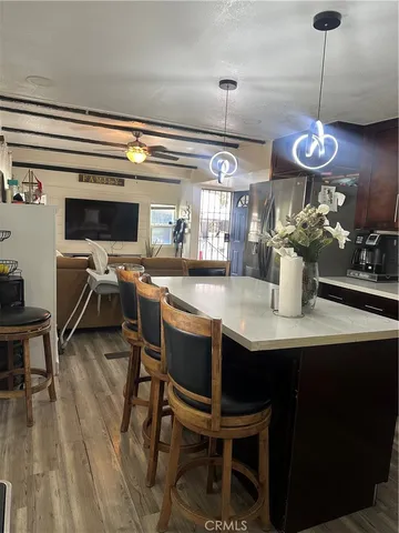 a kitchen with a table and chairs in it