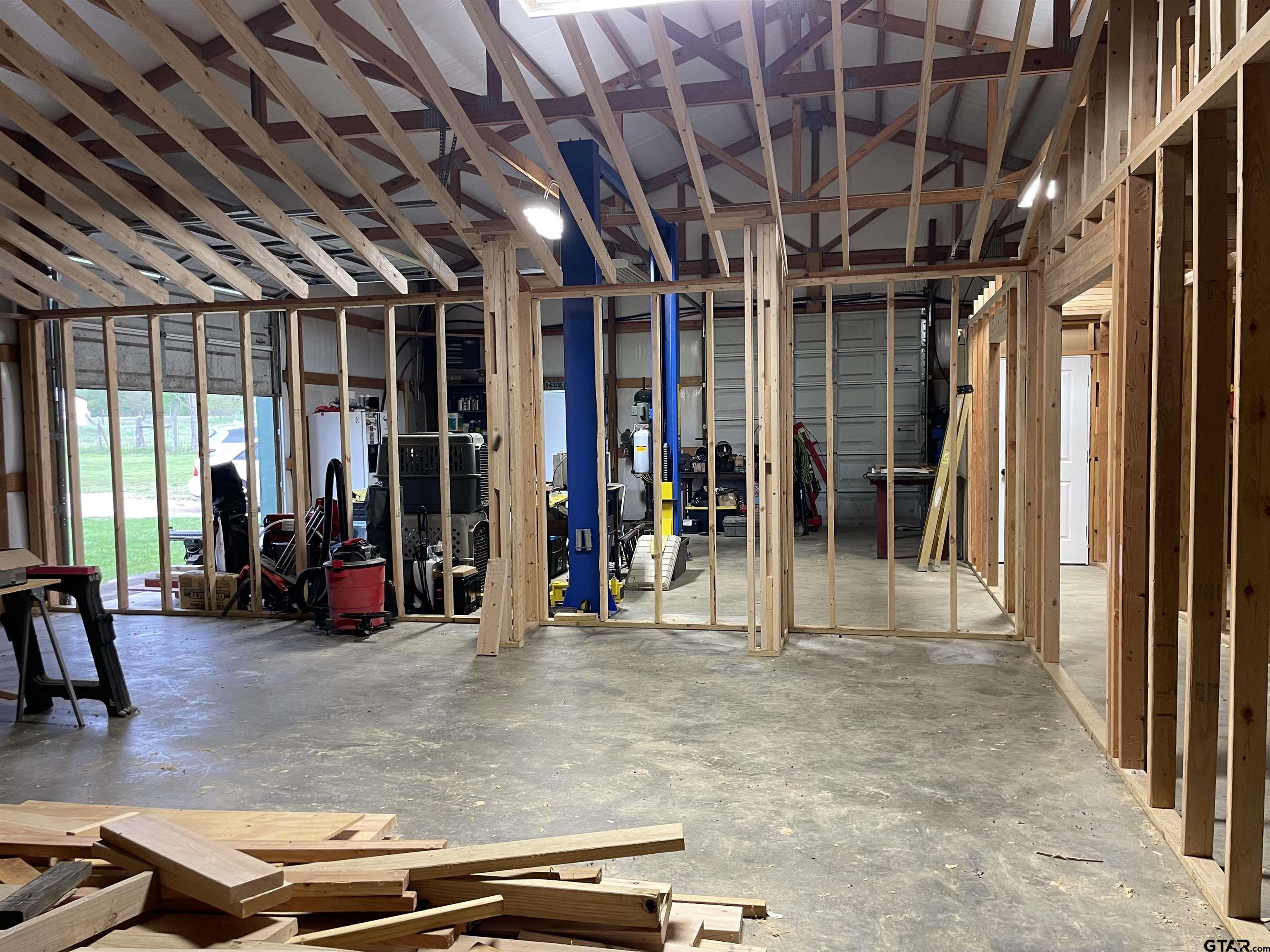 677 South Chandler Street Rusk, TX 75785 - Photo 7 of 16 a view of a room with wooden roof and glass windows