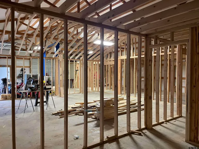 a view of living room with balcony and furniture