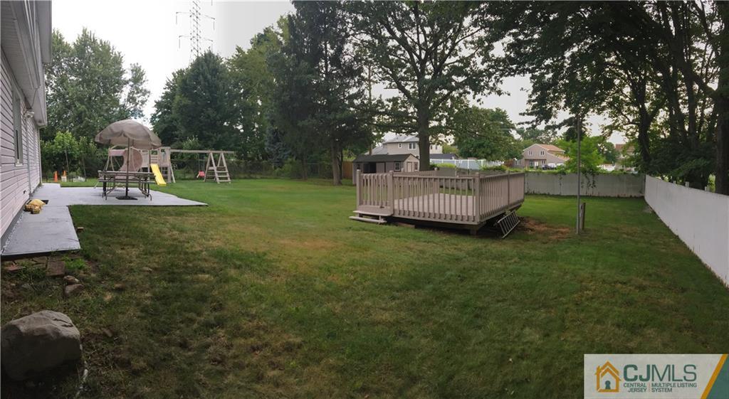 9 Roxy Avenue Edison, NJ 08820 - Photo 22 of 24 a view of a tiny house with a yard