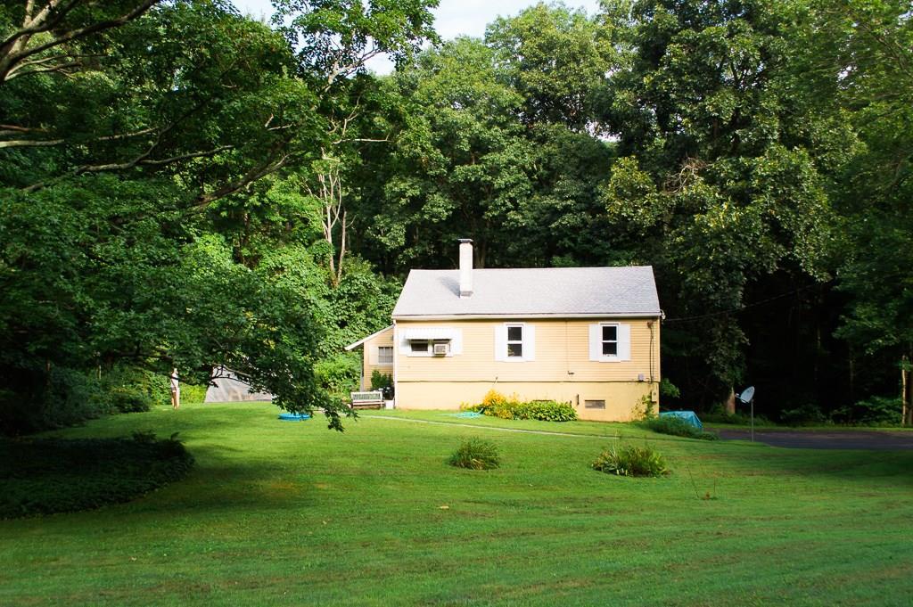 535 Mountain Road Cheshire, CT 06410 - Photo 1 of 1 a view of house with a big yard