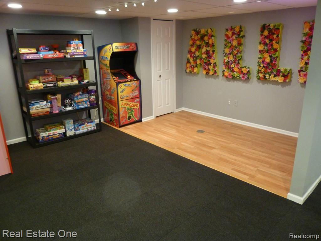 35124 Spring Hill Road Farmington, MI 48331 - Photo 23 of 27 finished lower level with dance floor