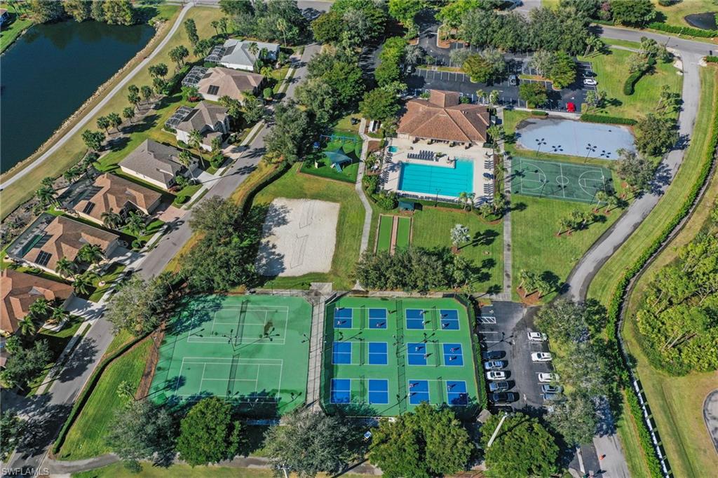 21684 Brixham Run Loop Estero, FL 33928 - Photo 23 of 26 Aerial view of property's location with a nearby body of water and nearby suburban area