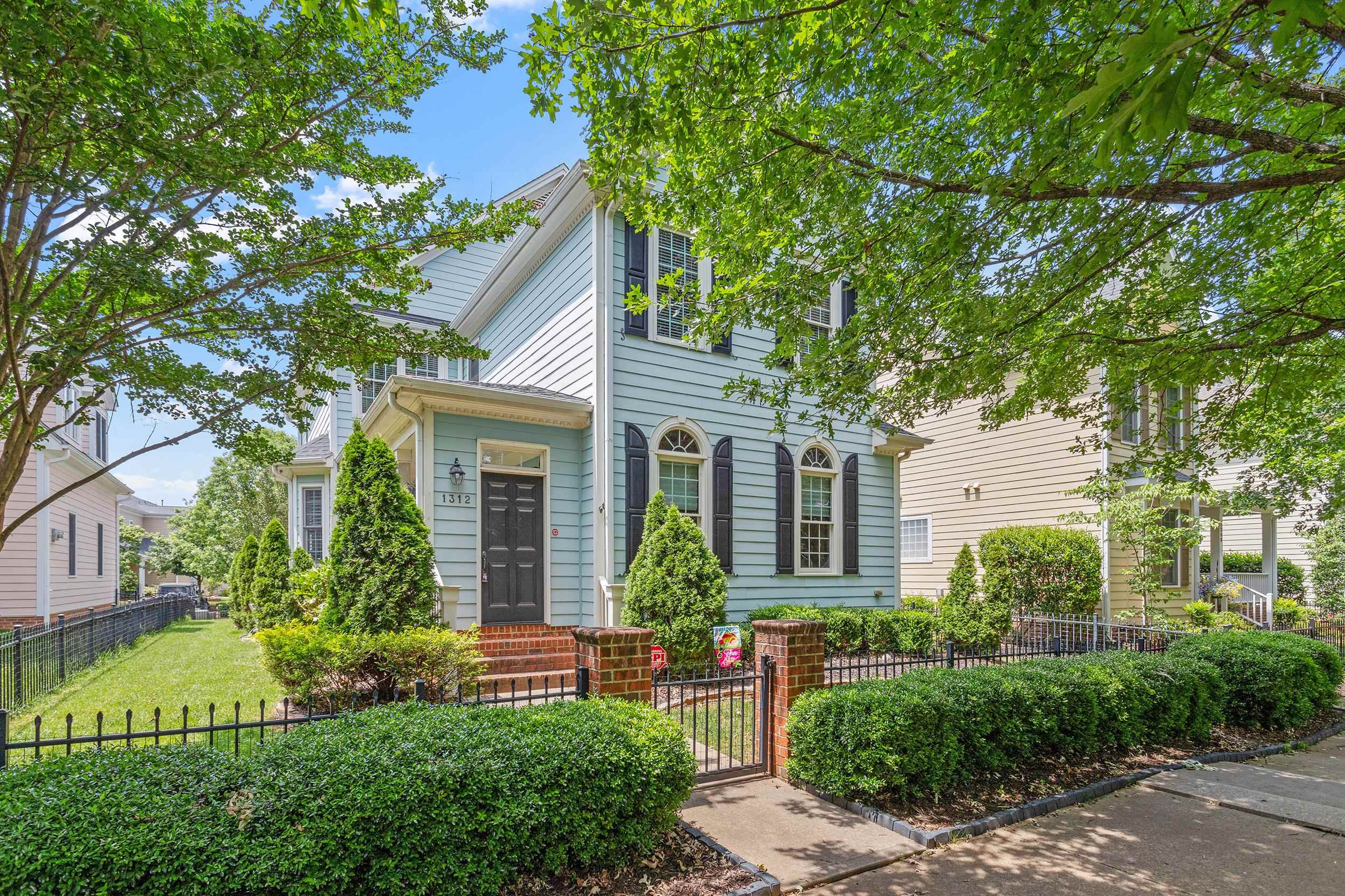 1312 Ileagnes Road Raleigh, NC 27603 - Photo 1 of 34 front view of a house with a yard