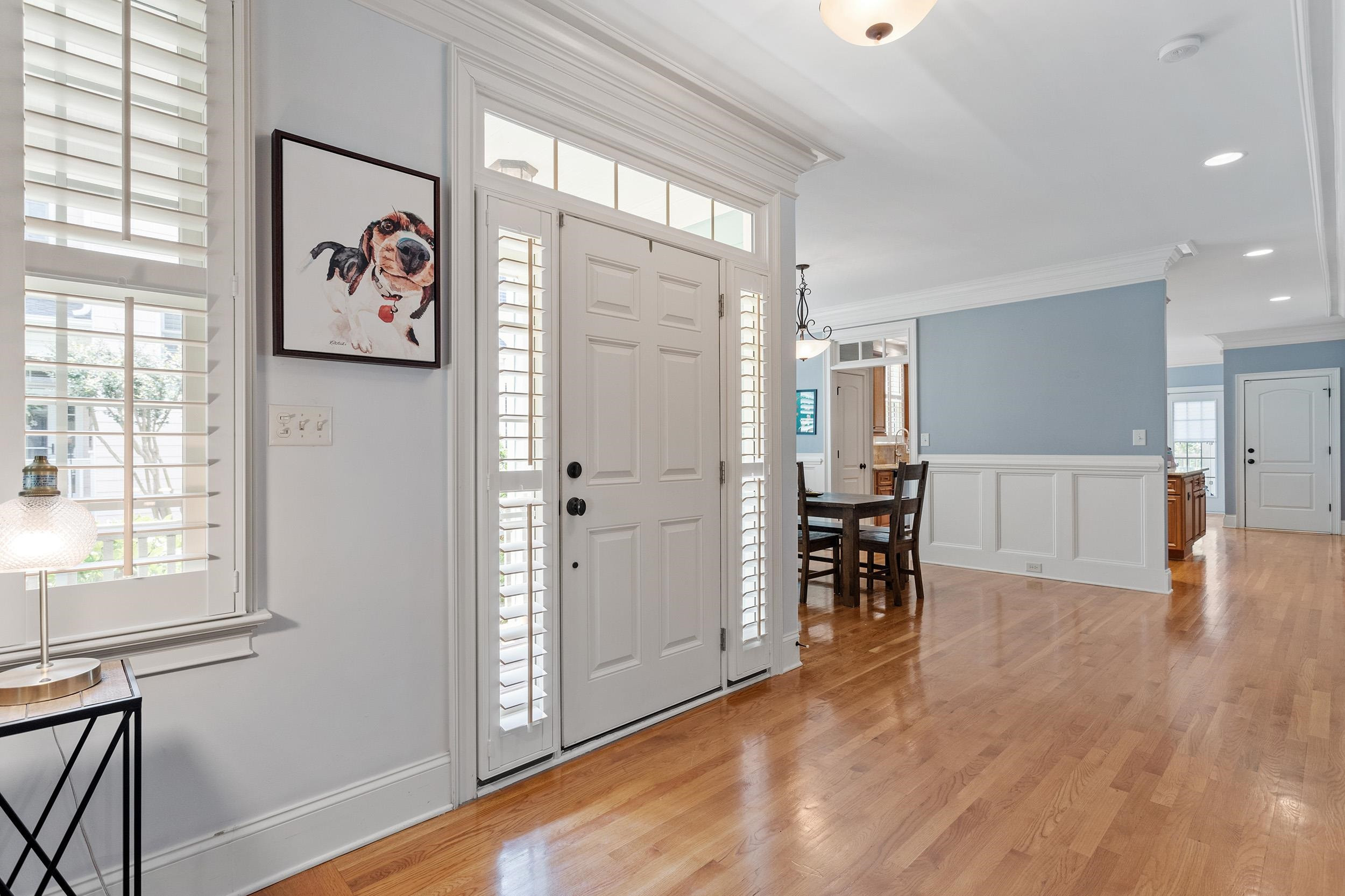 1312 Ileagnes Road Raleigh, NC 27603 - Photo 4 of 34 a view of a room with furniture and wooden floor