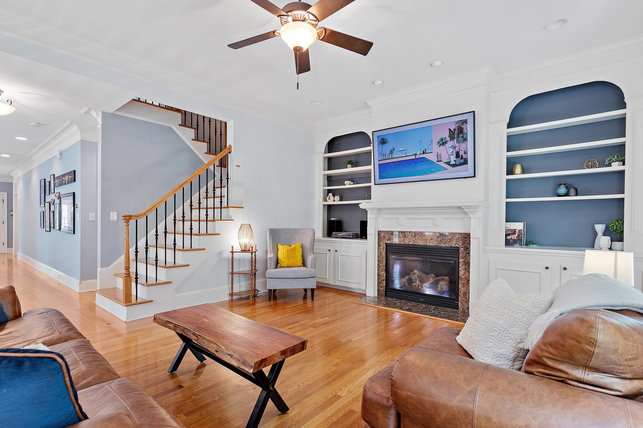 1312 Ileagnes Road Raleigh, NC 27603 - Photo 5 of 34 a living room with furniture and a fireplace