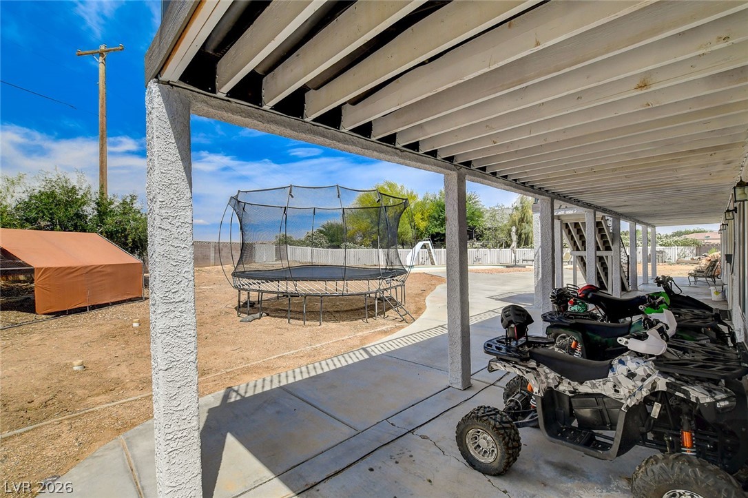 4362 Thistle Street Logandale, NV 89021 - Photo 88 of 99 A spacious covered patio offers ample room for recreation and outdoor enjoyment.