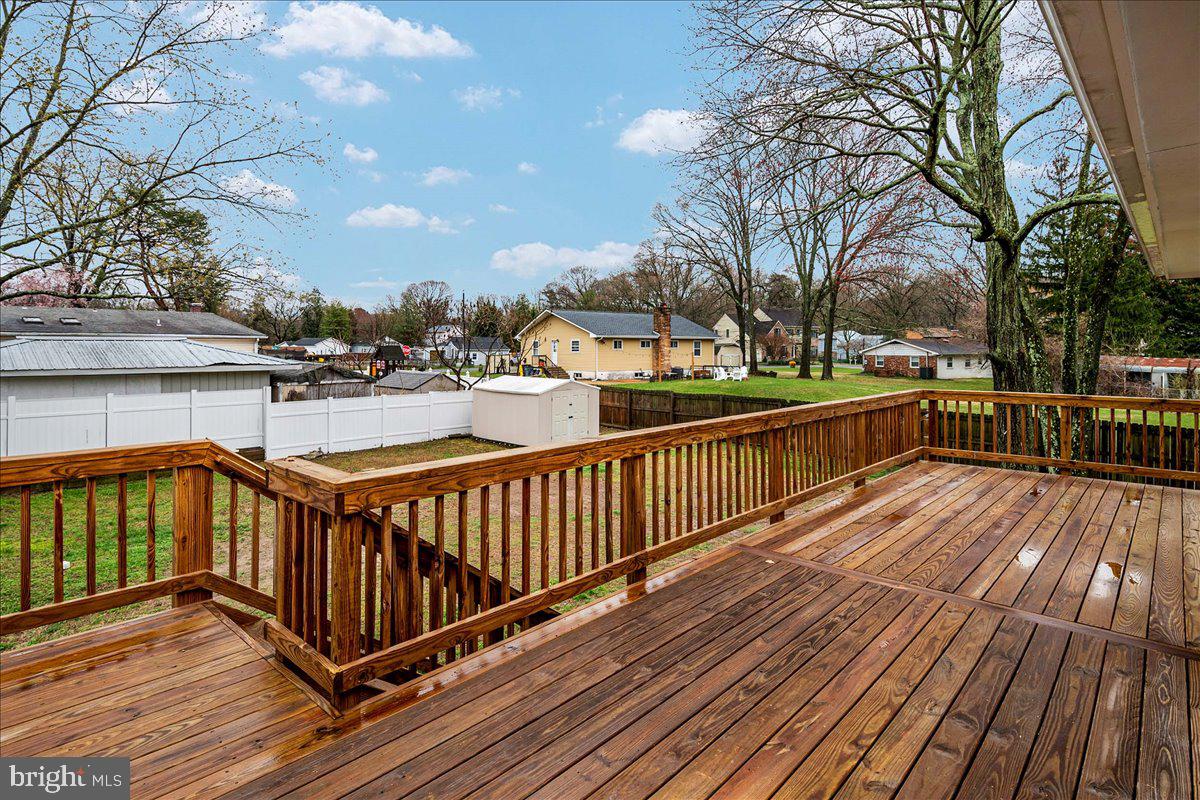 7811 Elizabeth Road Pasadena, MD 21122 - Photo 29 of 33 Large Deck wStairs to Yard