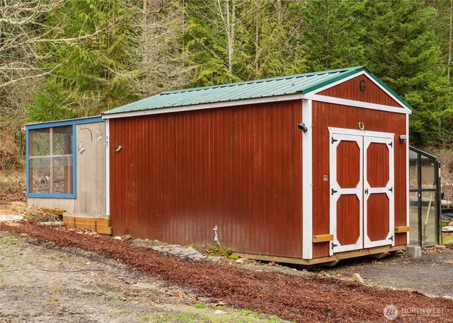 a wooden door in front of a house