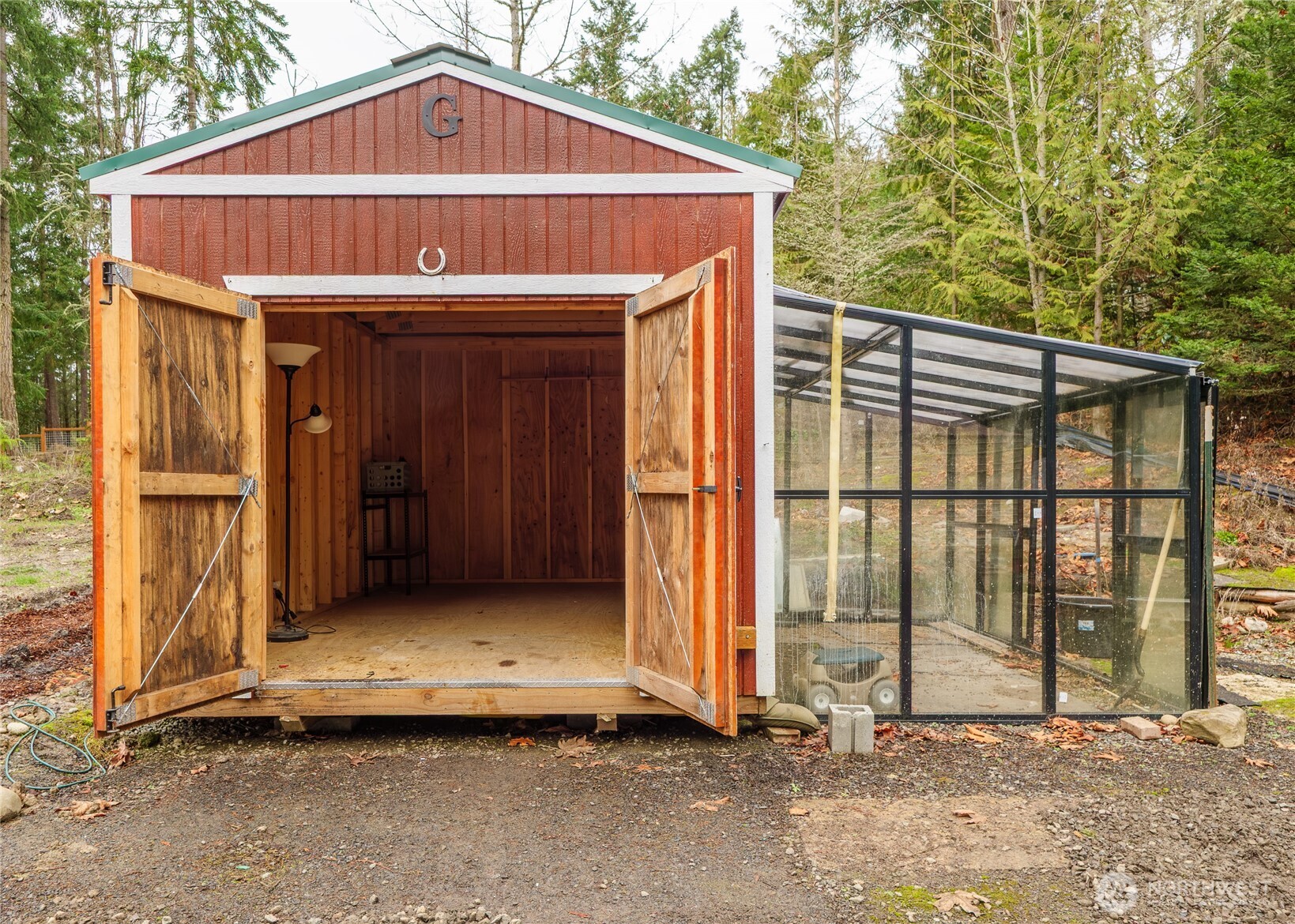 193 Springwater Lane Sequim, WA 98382 - Photo 21 of 40 a front view of a house with a garden