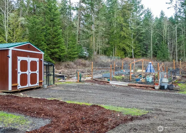 a view of backyard with green space