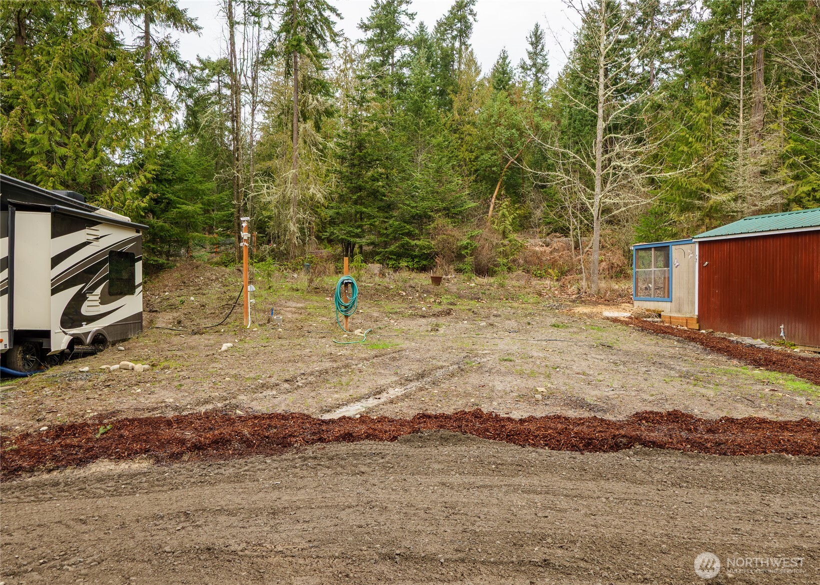 193 Springwater Lane Sequim, WA 98382 - Photo 24 of 40 a view of a backyard of the house