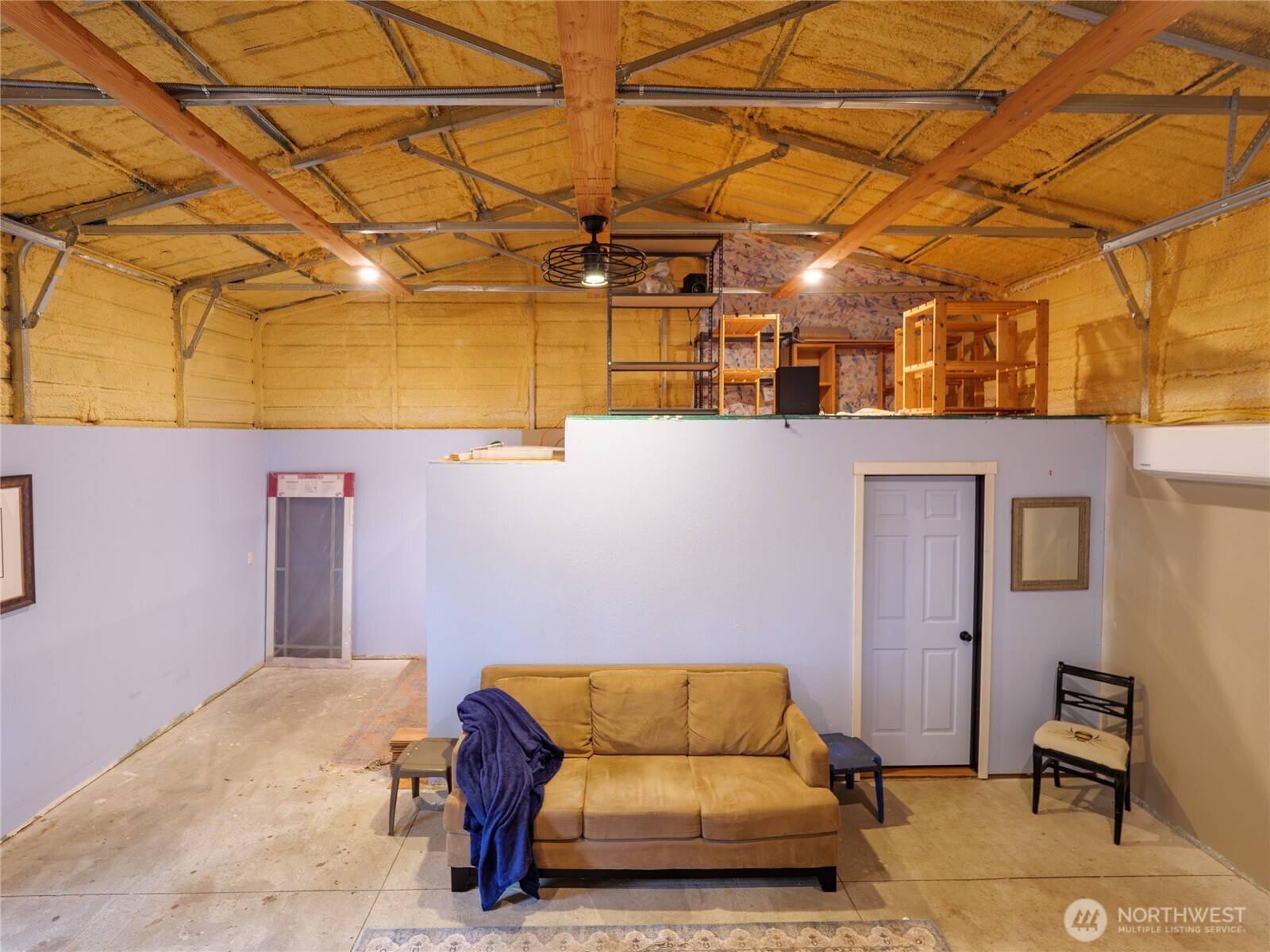 193 Springwater Lane Sequim, WA 98382 - Photo 32 of 40 a living room with a couch
