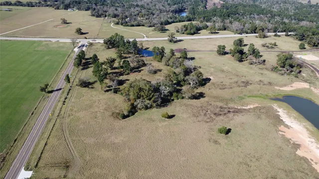 a view of beach and yard with ocean