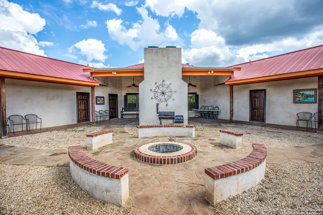 a view of a terrace with a back yard