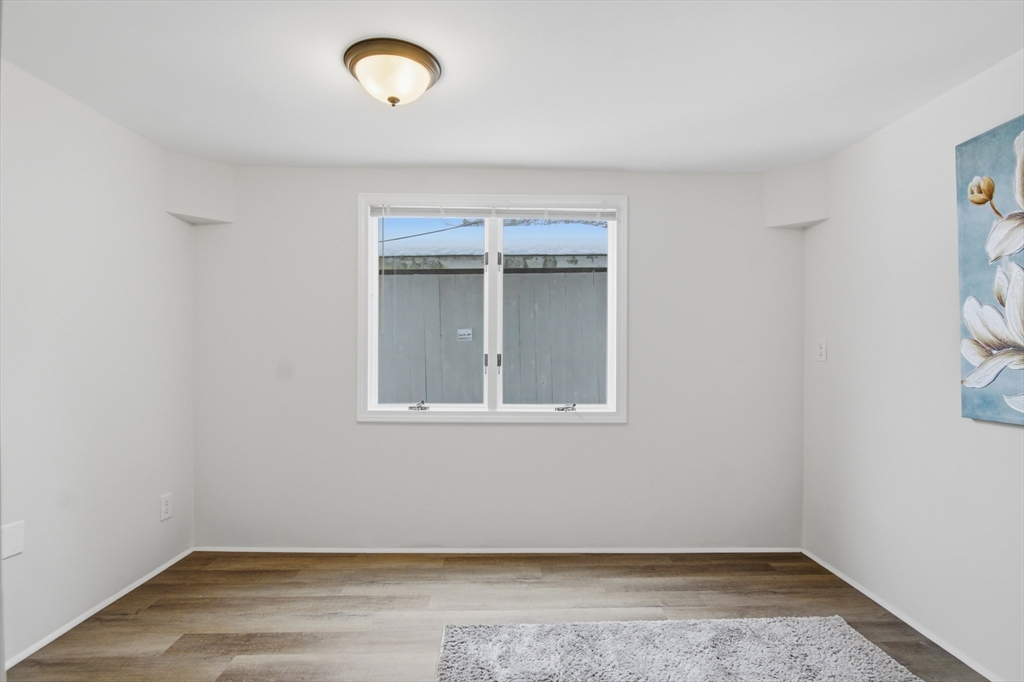 18 Maple Street, Unit 14 Pepperell, MA 01463 - Photo 18 of 27 an empty room with a window