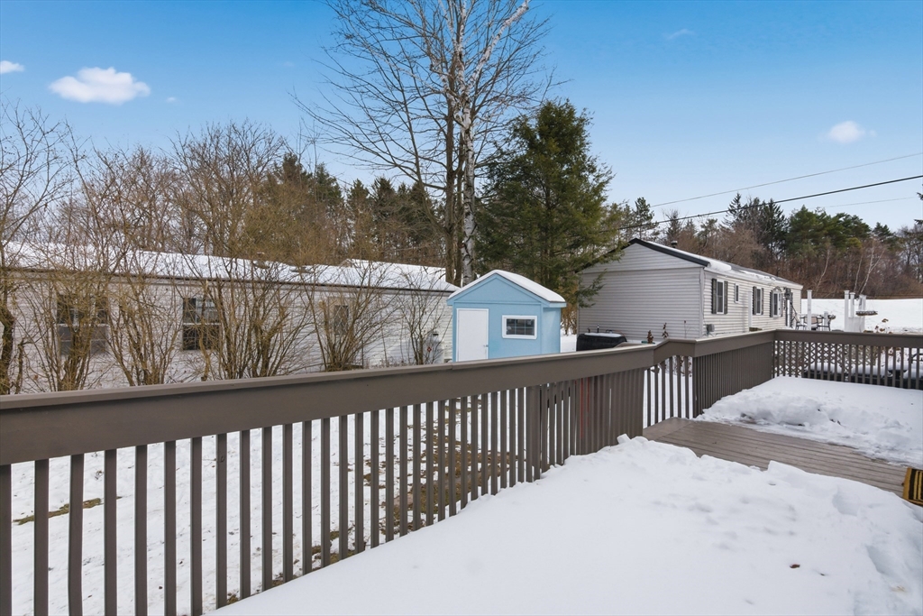 18 Maple Street, Unit 14 Pepperell, MA 01463 - Photo 25 of 27 a view of a street from a balcony